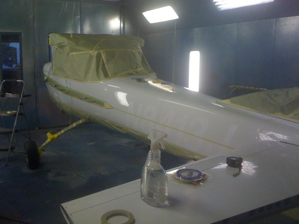 Aircraft on calibrated scales for weight and balance at DJS Aviation