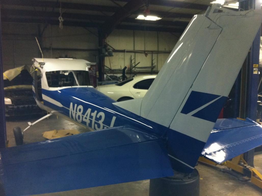 Aircraft on calibrated scales for weight and balance at DJS Aviation